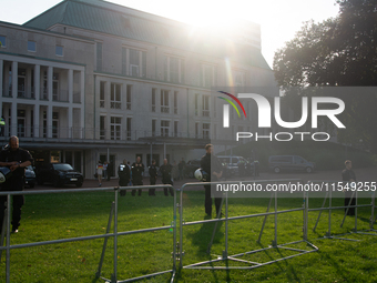 Police force guards the AFD event area as thousands of people take part in a demonstration against the AF politician event for community dia...