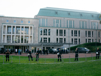 Police force guards the AFD event area as thousands of people take part in a demonstration against the AF politician event for community dia...