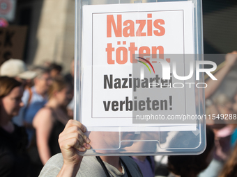 Thousands of people take part in a demonstration against an AF politician event for community dialogue at Essen Philharmonic Hall in Essen,...