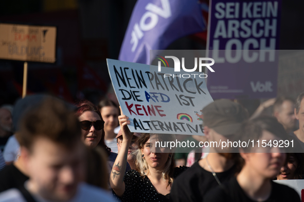 Thousands of people take part in a demonstration against an AF politician event for community dialogue at Essen Philharmonic Hall in Essen,...