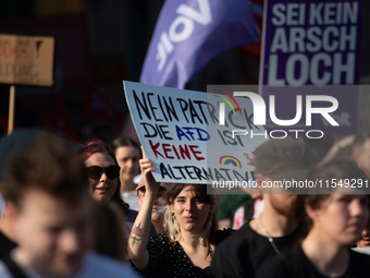 Thousands of people take part in a demonstration against an AF politician event for community dialogue at Essen Philharmonic Hall in Essen,...