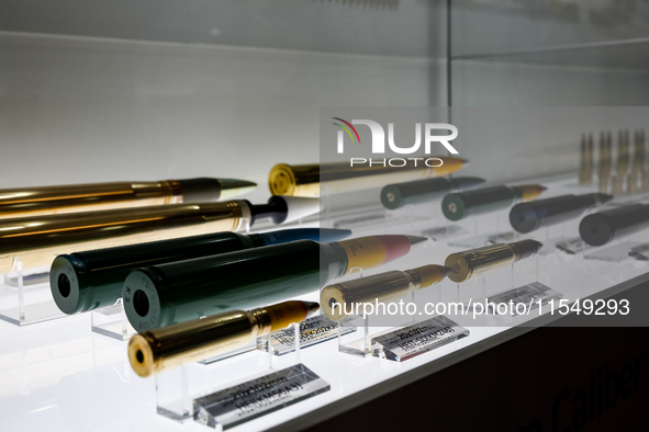 Visitors look at ammunition from Poongsani as they attend the 32nd International Defence Industry Exhibition - MSPO i Targi Kielce in centra...