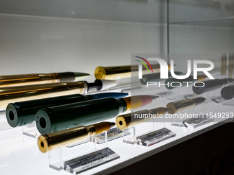 Visitors look at ammunition from Poongsani as they attend the 32nd International Defence Industry Exhibition - MSPO i Targi Kielce in centra...