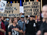 Thousands of people take part in a demonstration against an AF politician event for community dialogue at Essen Philharmonic Hall in Essen,...