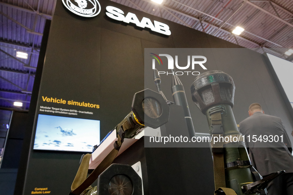 Visitors look at armour units from Saab as they attend the 32nd International Defence Industry Exhibition - MSPO i Targi Kielce in central P...