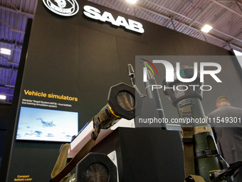 Visitors look at armour units from Saab as they attend the 32nd International Defence Industry Exhibition - MSPO i Targi Kielce in central P...