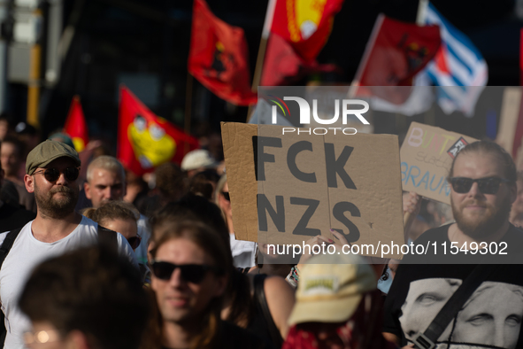 Thousands of people take part in a demonstration against an AF politician event for community dialogue at Essen Philharmonic Hall in Essen,...