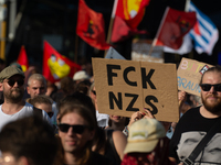 Thousands of people take part in a demonstration against an AF politician event for community dialogue at Essen Philharmonic Hall in Essen,...