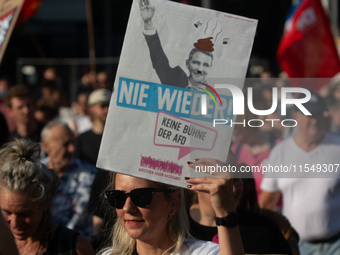 Thousands of people take part in a demonstration against an AF politician event for community dialogue at Essen Philharmonic Hall in Essen,...