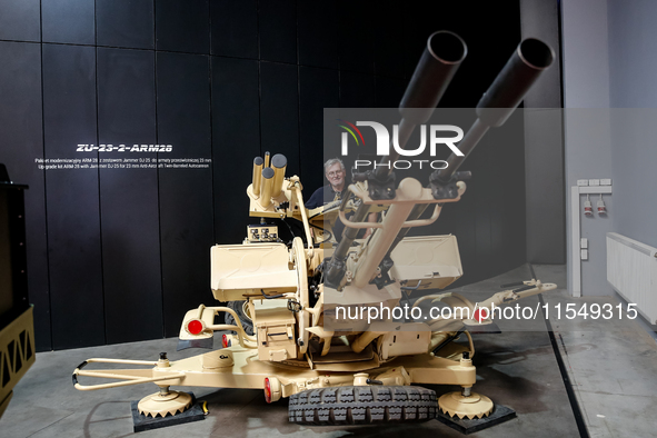 A visitor looks upgrade kit ARM-28 from WB Group as he attends the 32nd International Defence Industry Exhibition - MSPO i Targi Kielce in c...