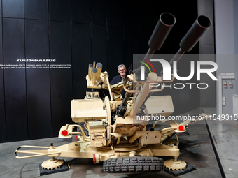 A visitor looks upgrade kit ARM-28 from WB Group as he attends the 32nd International Defence Industry Exhibition - MSPO i Targi Kielce in c...