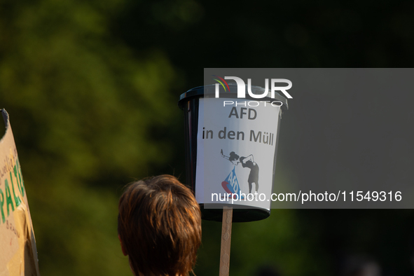 Thousands of people take part in a demonstration against an AF politician event for community dialogue at Essen Philharmonic Hall in Essen,...