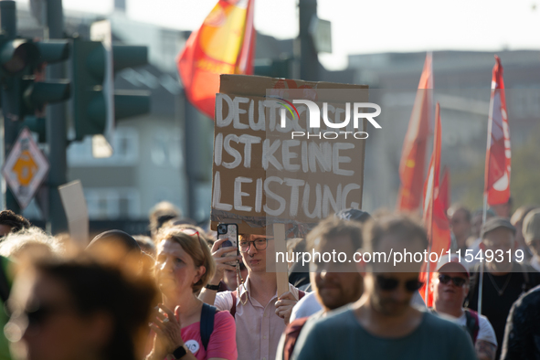 Thousands of people take part in a demonstration against an AF politician event for community dialogue at Essen Philharmonic Hall in Essen,...