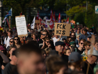 Thousands of people take part in a demonstration against an AF politician event for community dialogue at Essen Philharmonic Hall in Essen,...