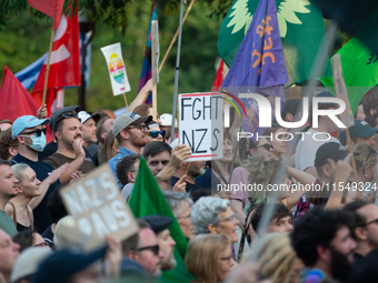 Thousands of people take part in a demonstration against an AF politician event for community dialogue at Essen Philharmonic Hall in Essen,...