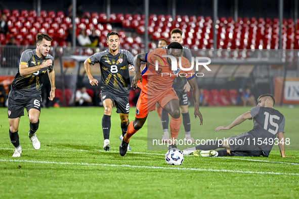 North Macedonia player Stefan Despotovski, North Macedonia player Ivan Nikolov, Netherlands player Noah Ohio, and North Macedonia player Imr...