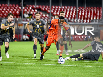 North Macedonia player Stefan Despotovski, North Macedonia player Ivan Nikolov, Netherlands player Noah Ohio, and North Macedonia player Imr...