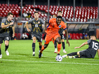 North Macedonia player Stefan Despotovski, North Macedonia player Ivan Nikolov, Netherlands player Noah Ohio, and North Macedonia player Imr...