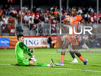 North Macedonia goalkeeper Marko Alchevski and Netherlands player Emmanuel Emegha during the match between the Netherlands and North Macedon...