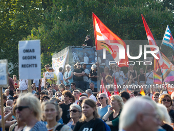 Thousands of people take part in a demonstration against an AF politician event for community dialogue at Essen Philharmonic Hall in Essen,...