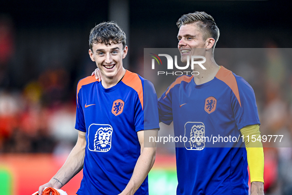 Netherlands player Youri Baas and Netherlands goalkeeper Calvin Raatsie during the match between the Netherlands and North Macedonia at the...