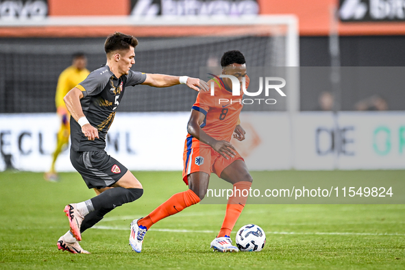 North Macedonia player Reshat Ramadani and Netherlands player Antoni Milambo during the match between the Netherlands and North Macedonia at...