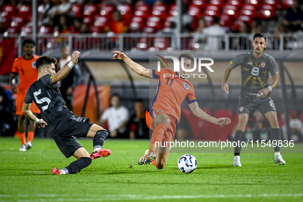 North Macedonia player Reshat Ramadani and Netherlands player Ruben van Bommel during the match between Netherlands and North Macedonia at t...