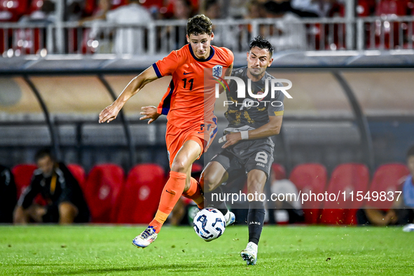 Netherlands player Ruben van Bommel and North Macedonia player Ivan Nikolov during the match between the Netherlands and North Macedonia at...