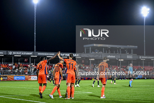 Netherlands player Noah Ohio and Netherlands player Ruben van Bommel celebrate the goal during the match between the Netherlands and North M...