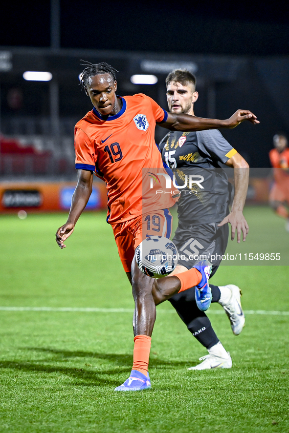 Netherlands player Emmanuel Emegha and North Macedonia player Imran Fetai during the match between the Netherlands and North Macedonia at th...