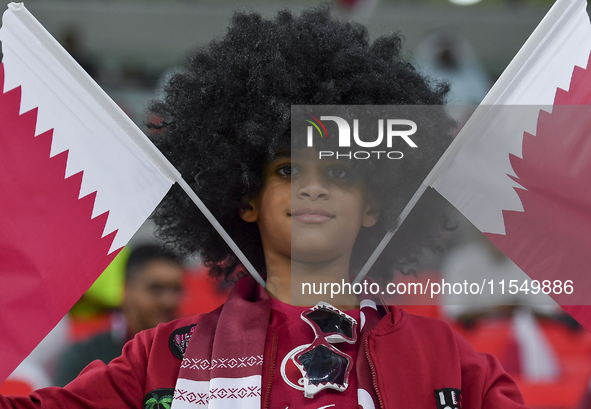 Qatar team supporters cheer for their team during the qualification 3rd round for the FIFA World Cup 2026 group A match between Qatar and Un...