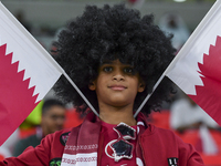 Qatar team supporters cheer for their team during the qualification 3rd round for the FIFA World Cup 2026 group A match between Qatar and Un...