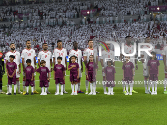 United Arab Emirates team players line up prior to the qualification 3rd round for the FIFA World Cup 2026 group A match between Qatar and U...