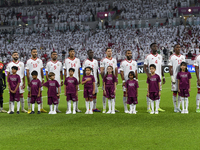 United Arab Emirates team players line up prior to the qualification 3rd round for the FIFA World Cup 2026 group A match between Qatar and U...