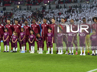 Qatar team players line up prior to the qualification 3rd round for the FIFA World Cup 2026 group A match between Qatar and United Arab Emir...