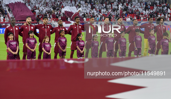 Qatar team players line up prior to the qualification 3rd round for the FIFA World Cup 2026 group A match between Qatar and United Arab Emir...