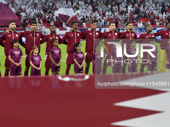 Qatar team players line up prior to the qualification 3rd round for the FIFA World Cup 2026 group A match between Qatar and United Arab Emir...