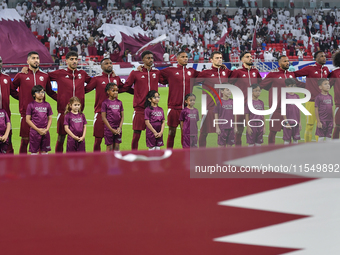 Qatar team players line up prior to the qualification 3rd round for the FIFA World Cup 2026 group A match between Qatar and United Arab Emir...