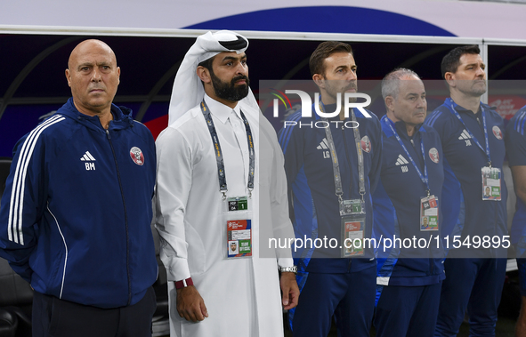 Head coach of Qatar Marquez Lopez and his staff line up before the qualification 3rd round for the FIFA World Cup 2026 group A match between...