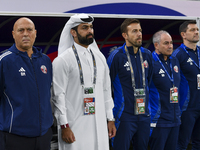 Head coach of Qatar Marquez Lopez and his staff line up before the qualification 3rd round for the FIFA World Cup 2026 group A match between...