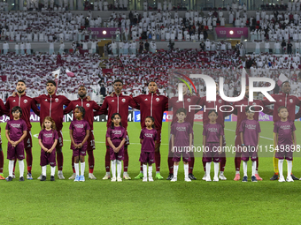 Qatar team players line up prior to the qualification 3rd round for the FIFA World Cup 2026 group A match between Qatar and United Arab Emir...