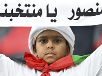 A fan of the United Arab Emirates cheers during the qualification 3rd round for the FIFA World Cup 2026 group A match between Qatar and the...