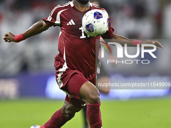 Ismail Mohamad of Qatar is in action during the qualification 3rd round for the FIFA World Cup 2026 group A match between Qatar and the Unit...