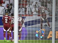 Ibrahim Mohammadali of Qatar celebrates with his teammate after scoring during the qualification 3rd round for the FIFA World Cup 2026 group...