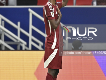 Ibrahim Mohammadali of Qatar celebrates after scoring during the qualification 3rd round for the FIFA World Cup 2026 group A match between Q...