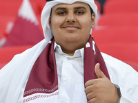 Qatar team supporters cheer for their team during the qualification 3rd round for the FIFA World Cup 2026 group A match between Qatar and Un...