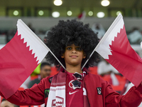 Qatar team supporters cheer for their team during the qualification 3rd round for the FIFA World Cup 2026 group A match between Qatar and Un...