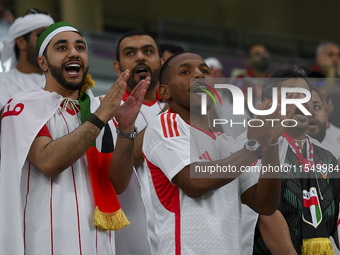 United Arab Emirates team supporters cheer for their team during the qualification 3rd round for the FIFA World Cup 2026 group A match betwe...