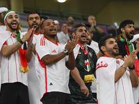 United Arab Emirates team supporters cheer for their team during the qualification 3rd round for the FIFA World Cup 2026 group A match betwe...