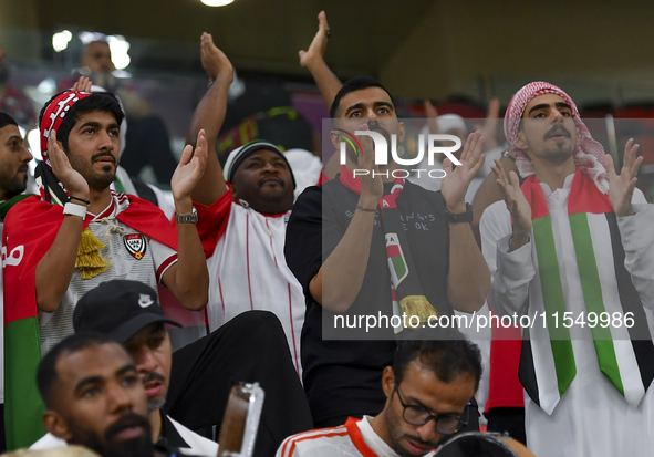 United Arab Emirates team supporters cheer for their team during the qualification 3rd round for the FIFA World Cup 2026 group A match betwe...